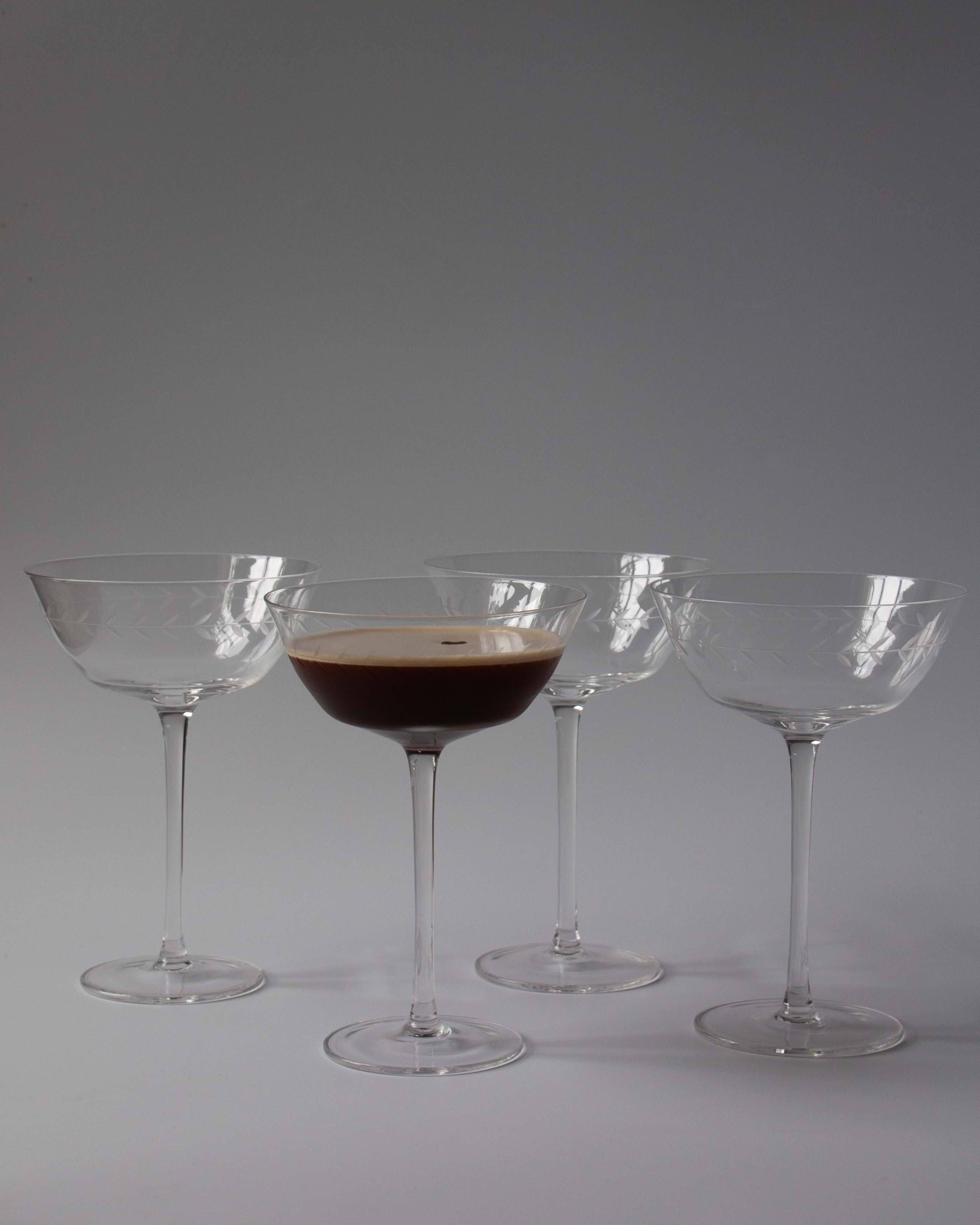 Set of four delicately decorated cocktail glasses | Anboise